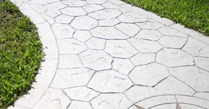 Printed grey concrete path compass